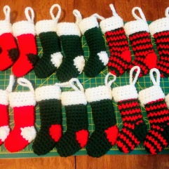http://www.maggiescrochet.com/pages/mini-christmas-stockings-free-crochet-pattern